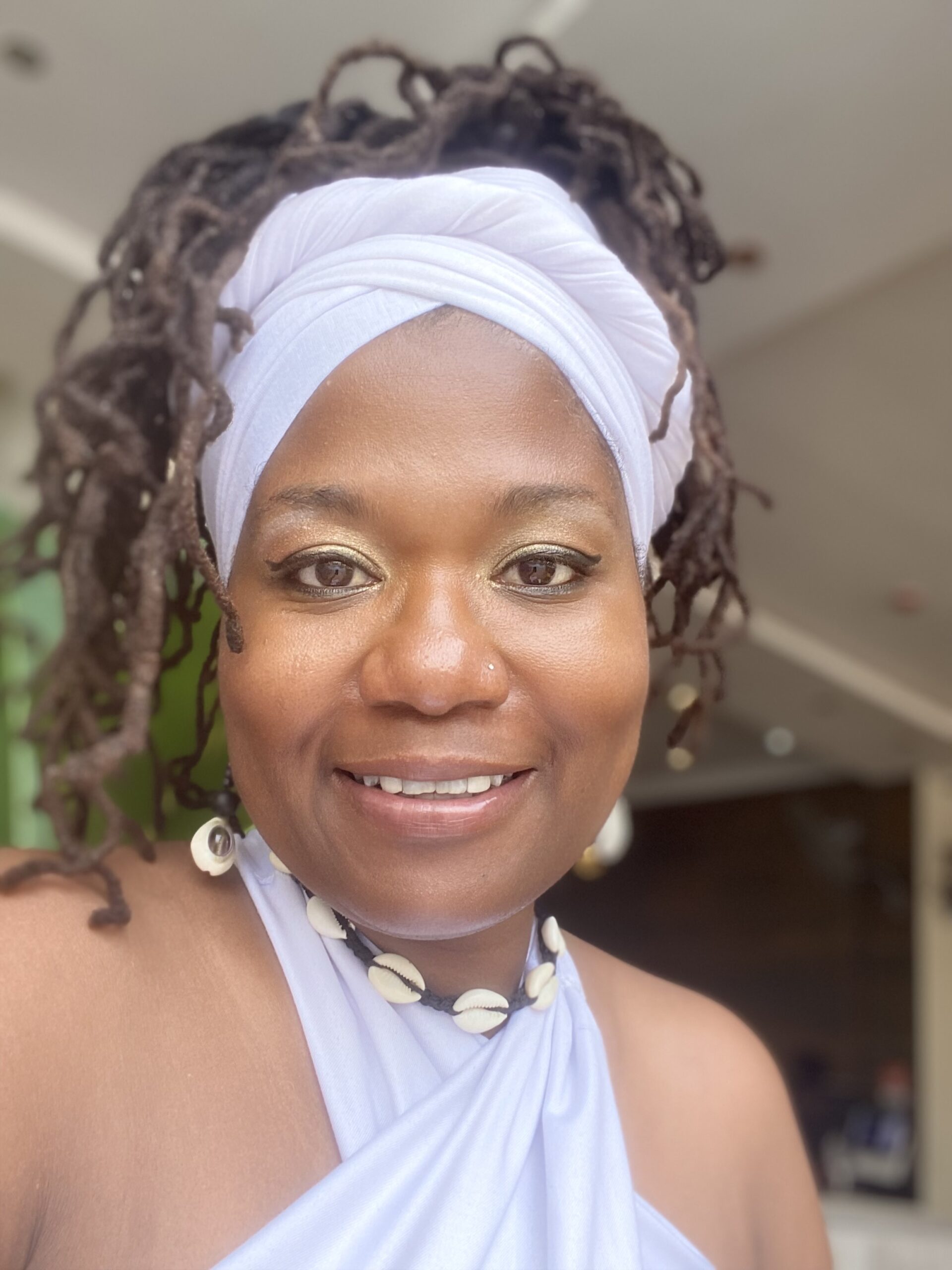 Pic of Angela in white head wrap